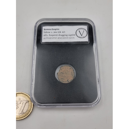 527 - A Roman Empire coin valens c. 364 - 378 AD. This is an authentic ancient coin presented in display c... 