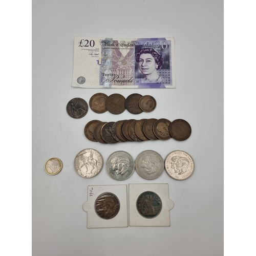 546 - A collection of United Kingdom currency, consisting of a fine Queen Elizabeth 20 pound note, togethe... 