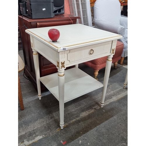 583 - A charming side table with single drawer with reeded detail to front with drip ring handle and lower... 