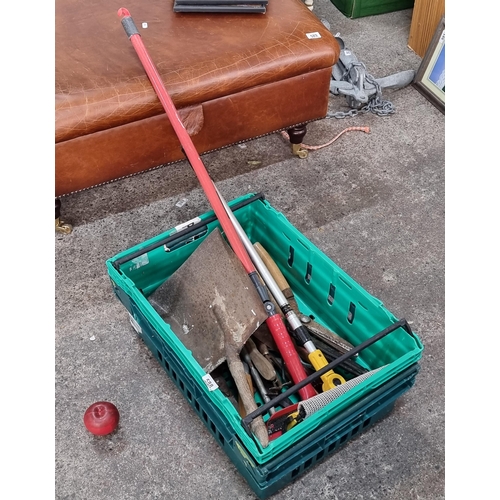 588 - A crate  filled with DIY and Gardening tools, including snippers, secretaires, trowels and more.