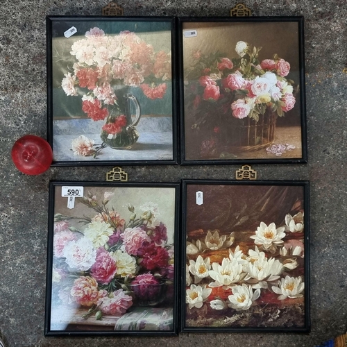 590 - Four high quality prints of flowers in lacquered wood frames.