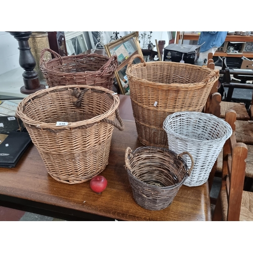 616 - A selection of five handmade wicker baskets. Including three very large examples suitable for use as... 