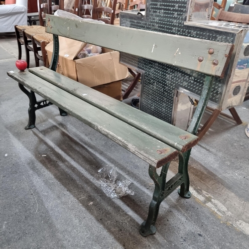 623 - A vintage two-seater bench with cast iron bench ends fabricated by J.P Corry and Co. Belfast. Suitab... 