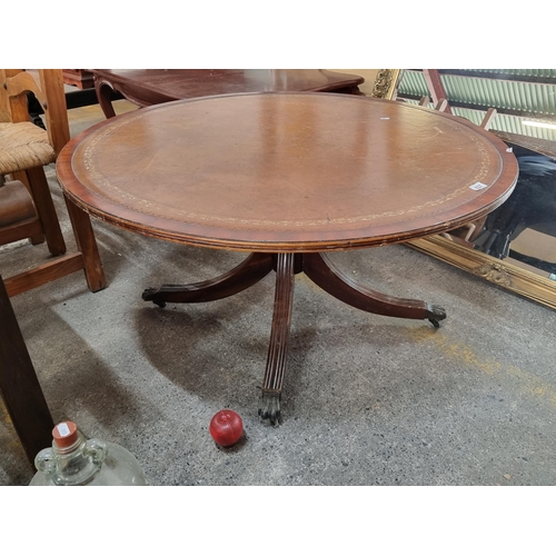 637 - Star lot : An antique Regency style round coffee table with splayed and reeded legs terminating in b... 