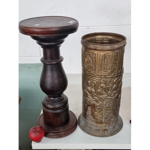 643 - A brass umbrella / stick stand with relief tavern scene. Along with a vintage Victorian style plant ... 