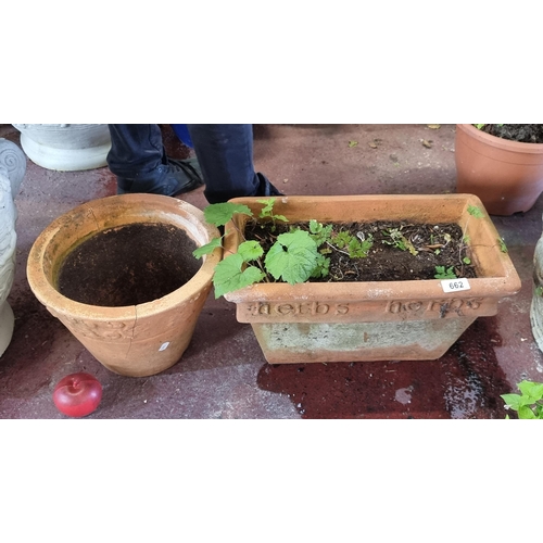 662 - Two terracotta planters including a rectangular window box style example with herbs written in motif... 