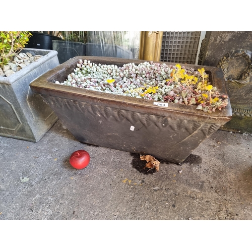 693 - A mature Sedum Spathulifolium Cape Blanco succulent held in a very heavy rectangular stone planter. ... 