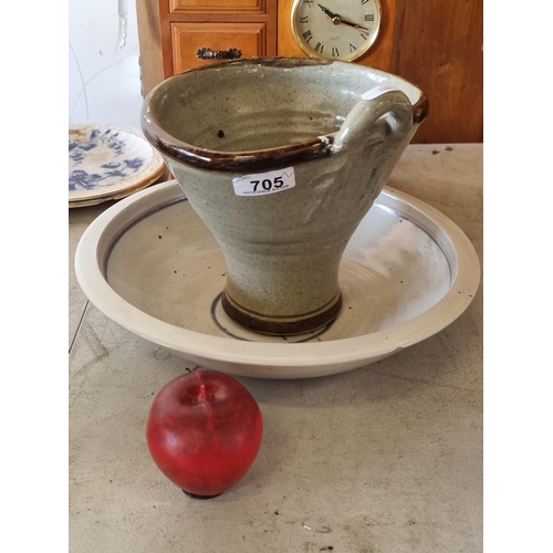 705 - Two charming handmade earthenware items including a large serving bowl with a delicate pink and blue... 