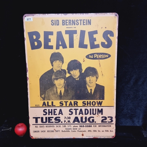 77 - A large and heavy metal wall sign advertising a performance by the Beatles.