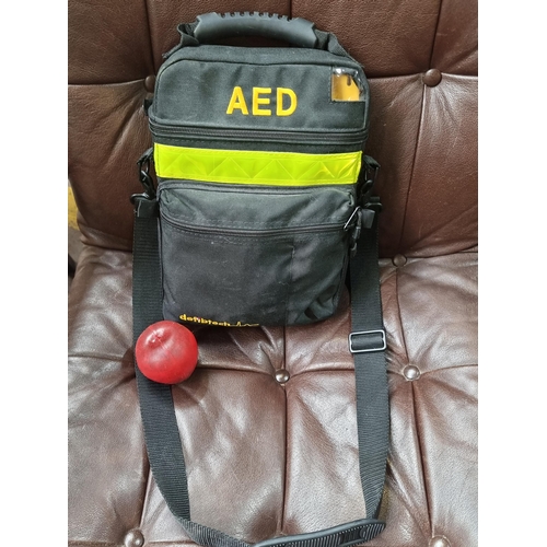 725 - A portable AED defibrillator made Defibtech. Along with an Ambu Res-Cue Mask, fabric scissors and ra... 