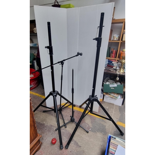 733 - Four tripod stands including two Proel heavy duty examples for use with speaker systems, along with ... 