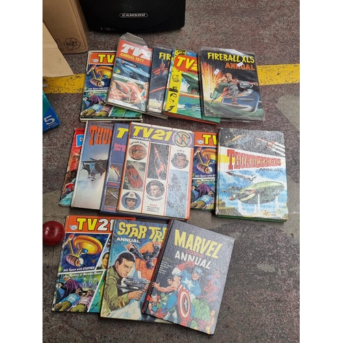 736 - A box containing a large number of vintage annuals including 