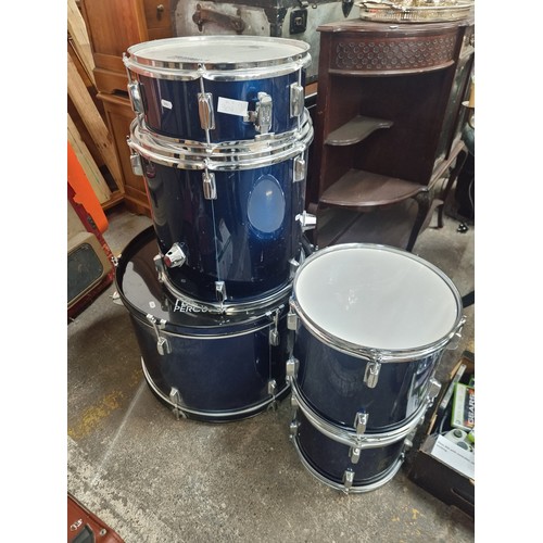 304 - Star lot : A fantastic drum set in good condition made by Performance Percussion. Includes snare dru... 