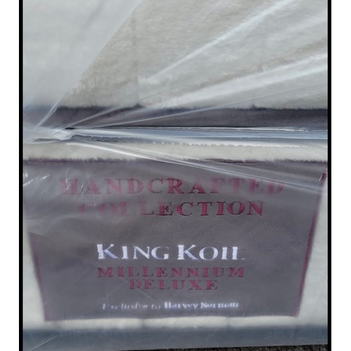 553 - Star Lot: A very large Super King Millennium Deluxe mattress from King Koil. MM: 6'0