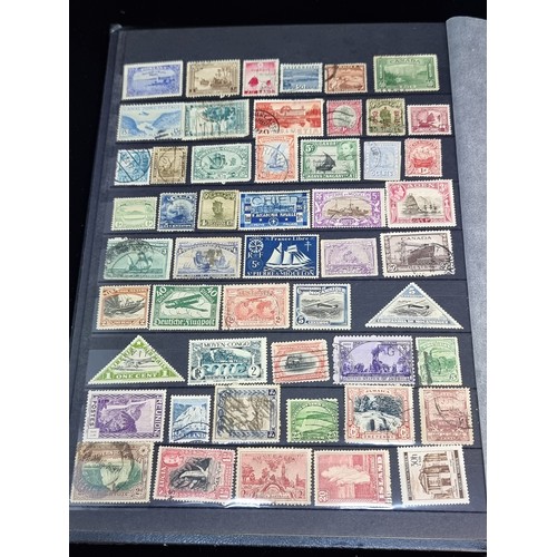 143 - A fabulous stamp album filled with 19th and 20th century global examples many in mint condition.