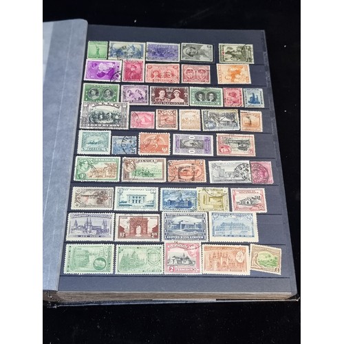 143 - A fabulous stamp album filled with 19th and 20th century global examples many in mint condition.