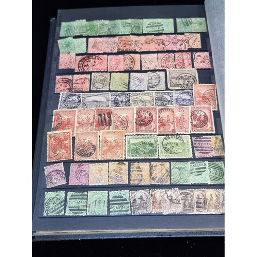 143 - A fabulous stamp album filled with 19th and 20th century global examples many in mint condition.