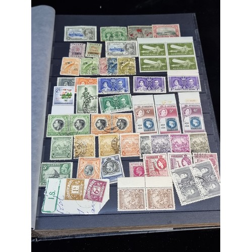 143 - A fabulous stamp album filled with 19th and 20th century global examples many in mint condition.