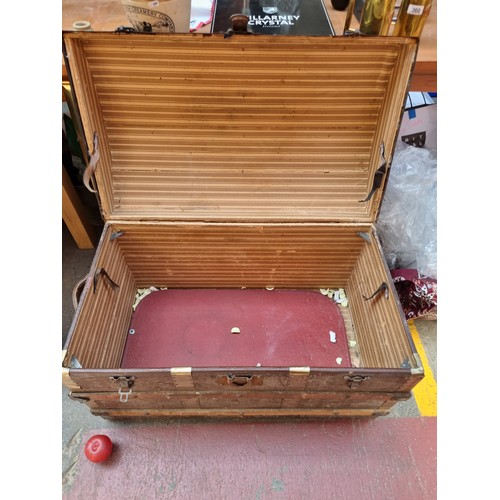 358 - A fabulous large antique domed top steamer trunk with leather exterior and metal fittings. H52cm x L... 