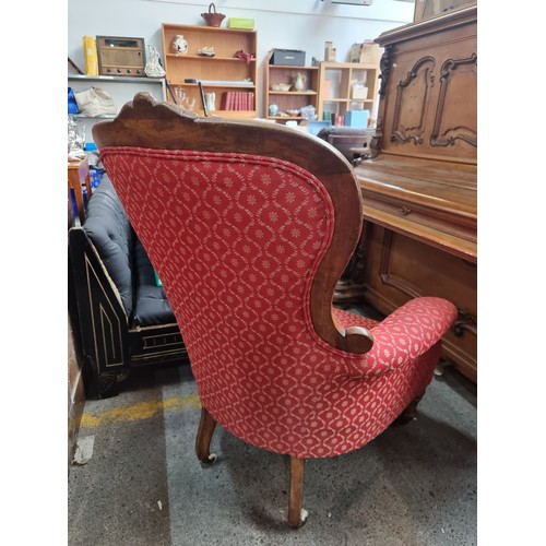 479 - Star lot : A wonderful antique mahogany gentleman's fireside armchair boasting a lovely cushioned sp... 