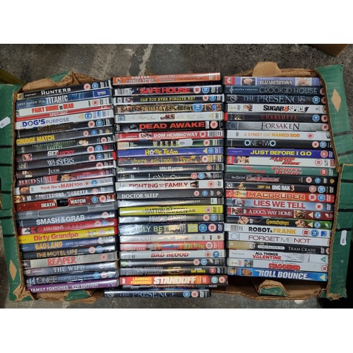 593 - Five large boxes filled with DVD's of all genres. Almost 350 DVD's, something for everyone to watch.