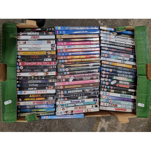 593 - Five large boxes filled with DVD's of all genres. Almost 350 DVD's, something for everyone to watch.