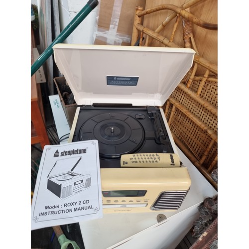 655 - A Steepletone Roxy 2 CD / radio and record player with remote in an 'authentic reproduction' vintage... 