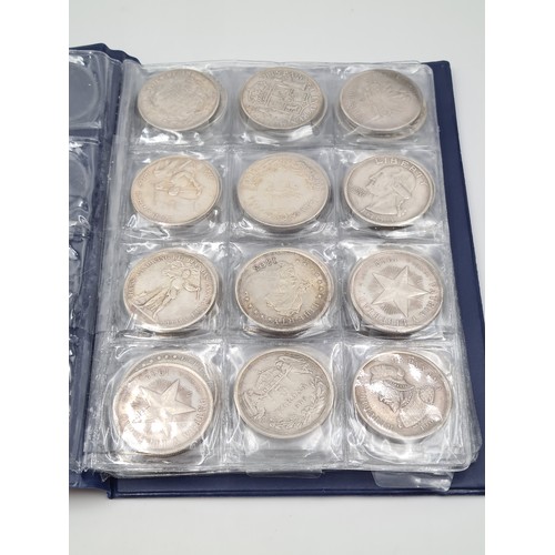 503 - A brilliant collection of 50 assorted reproduction  coins, encased in a album. Inc copies of some ve... 