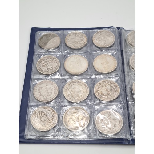 503 - A brilliant collection of 50 assorted reproduction  coins, encased in a album. Inc copies of some ve... 