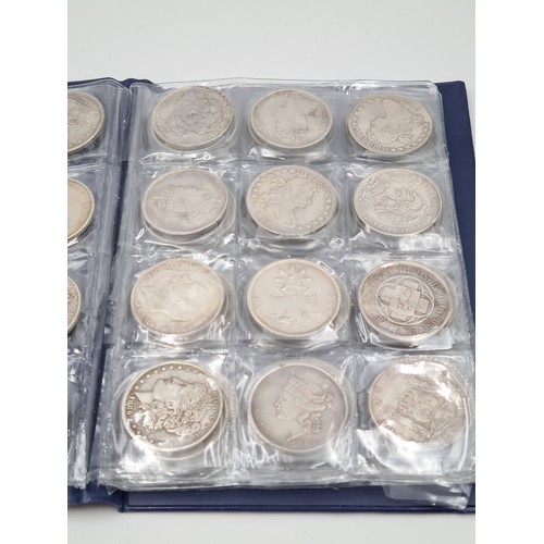 503 - A brilliant collection of 50 assorted reproduction  coins, encased in a album. Inc copies of some ve... 