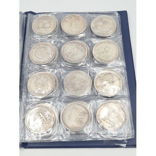 503 - A brilliant collection of 50 assorted reproduction  coins, encased in a album. Inc copies of some ve... 