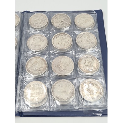 503 - A brilliant collection of 50 assorted reproduction  coins, encased in a album. Inc copies of some ve... 