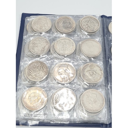 503 - A brilliant collection of 50 assorted reproduction  coins, encased in a album. Inc copies of some ve... 