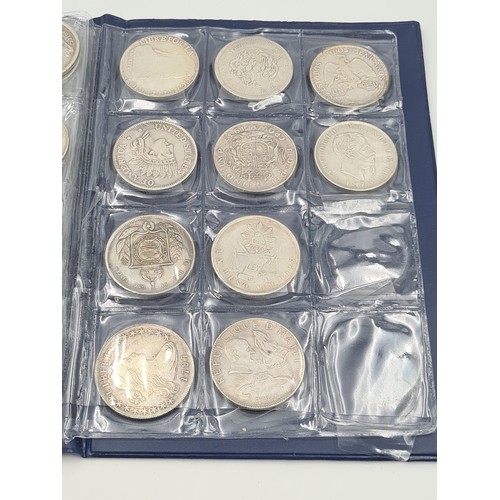 503 - A brilliant collection of 50 assorted reproduction  coins, encased in a album. Inc copies of some ve... 