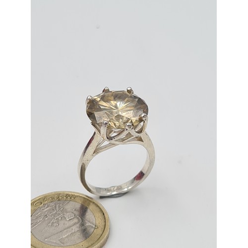 522 - A mesmerising 5 carat Yellow Moissanite stone ring, set in sterling silver and featuring a fabulous ... 