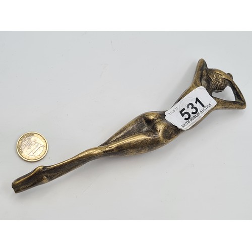 531 - An attractive Art Deco period brass figurative mount in the form of a female nude. MM: L19 x W5 cm. ... 