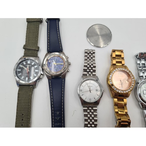 537 - A large collection of nine wrist watches, seven of which have metal bracelets. Together with a Sekon... 