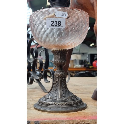 238 - A beautiful vintage oil lamp with an ornate brass base, a delicate pink glass bowl and complete with... 