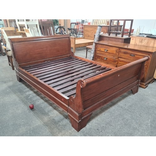 779 - Star Lot : A lovely solid oak queen size  Sleigh bed, with recessed paneling to headboard; a substan... 