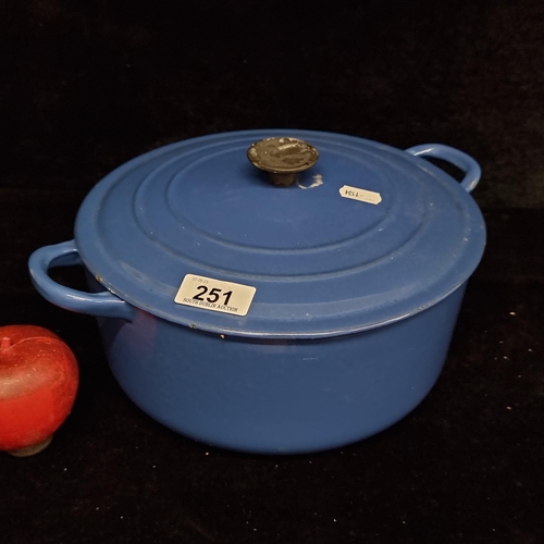 251 - A Le Creuset enamel cast iron lidded pot in a blue finish. With RRP of €249 on arnotts.ie.