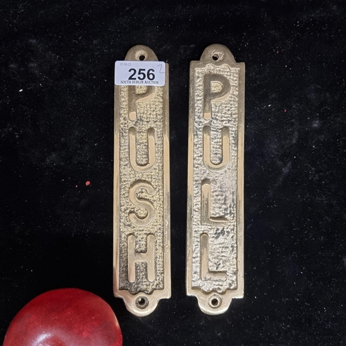 256 - Two brass door plaques reading 