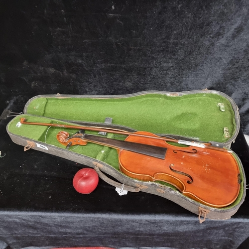 265 - A vintage full sized violin in original hard carry case.