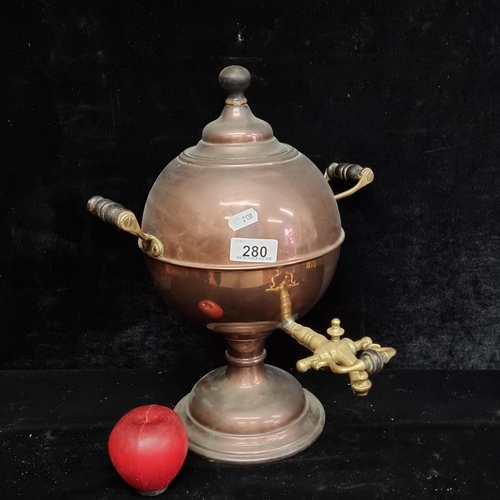 280 - A fabulous Victorian copper and brass samovar with lacquered turned handles and tap.