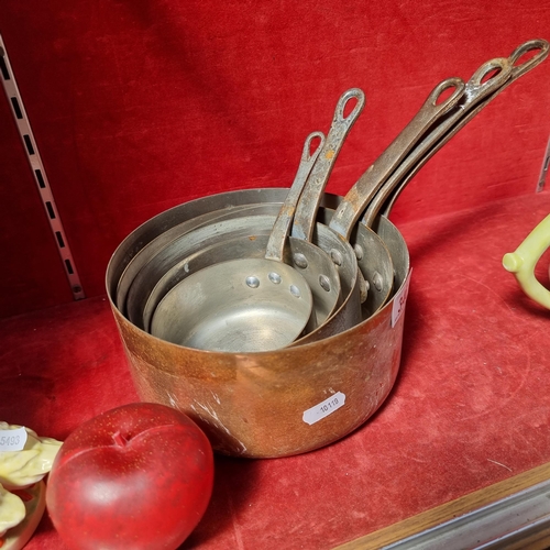 346 - A set of five vintage French made copper cooking pots by Les Cuivres de Faucogney in graduating size... 