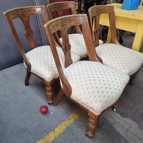 378 - Star Lot - A set of four antique dining chairs. With beautifully turned front legs and carved backre... 