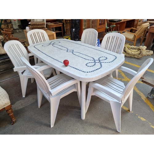 379 - Star Lot - A large garden dining suite from Nardi Garden Furniture comprising of a table with a tile... 