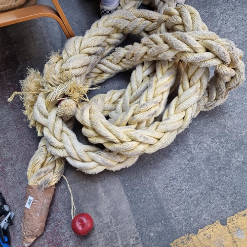 388 - A very large and heavy handknotted training rope of synthetic fibres. This is known as an exercise b... 