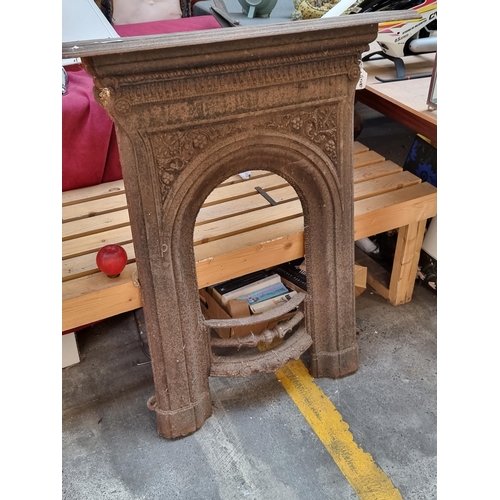 399 - A truly gorgeous antique cast metal fireplace. A beautifully elegant piece with an intricate frieze ... 