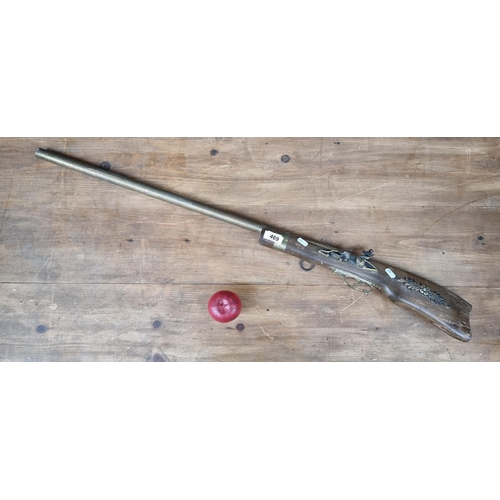 469 - A nice example of a prop rifle made by English prop gun brand Bel. Featuring a wooden stock and a br... 