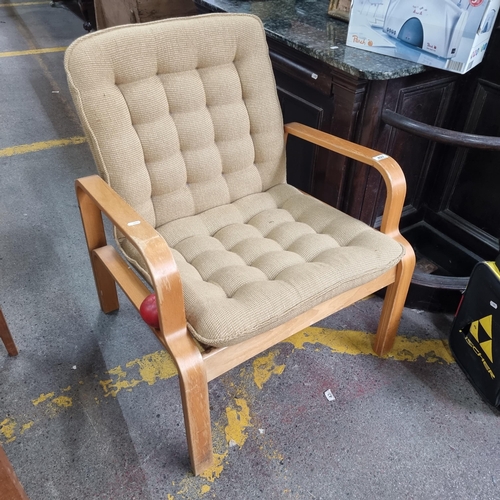 497 - A very stylish mid century bentwood armchair with lovely curved arms and frame, button back cushion ... 